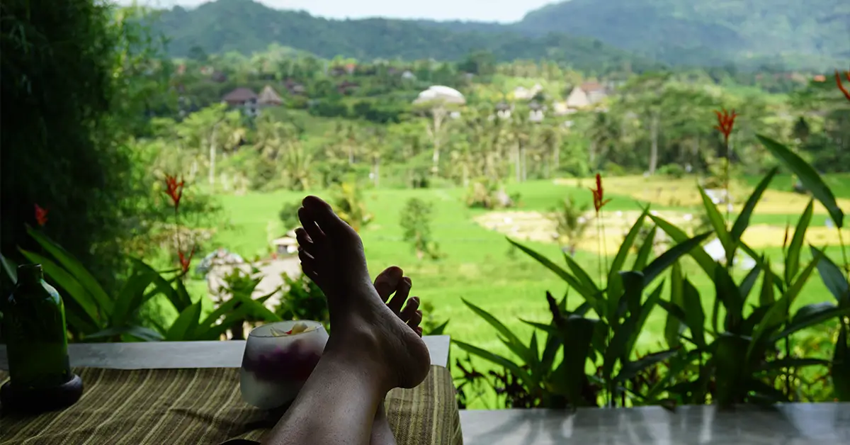 Girl enjoy view of rice fields and hills natural beauty in remote sidemen karangasem bali